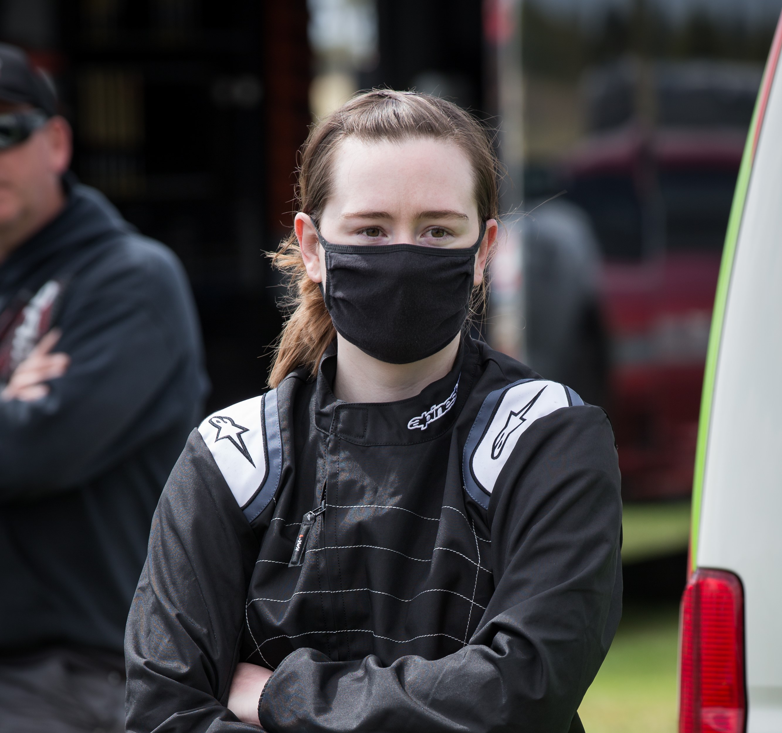 Racer wearing a face mask